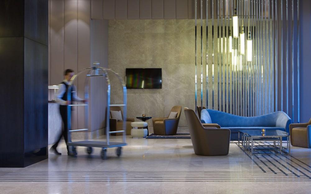 Doubletree By Hilton Minsk Hotel Bagian luar foto The lobby of the hotel