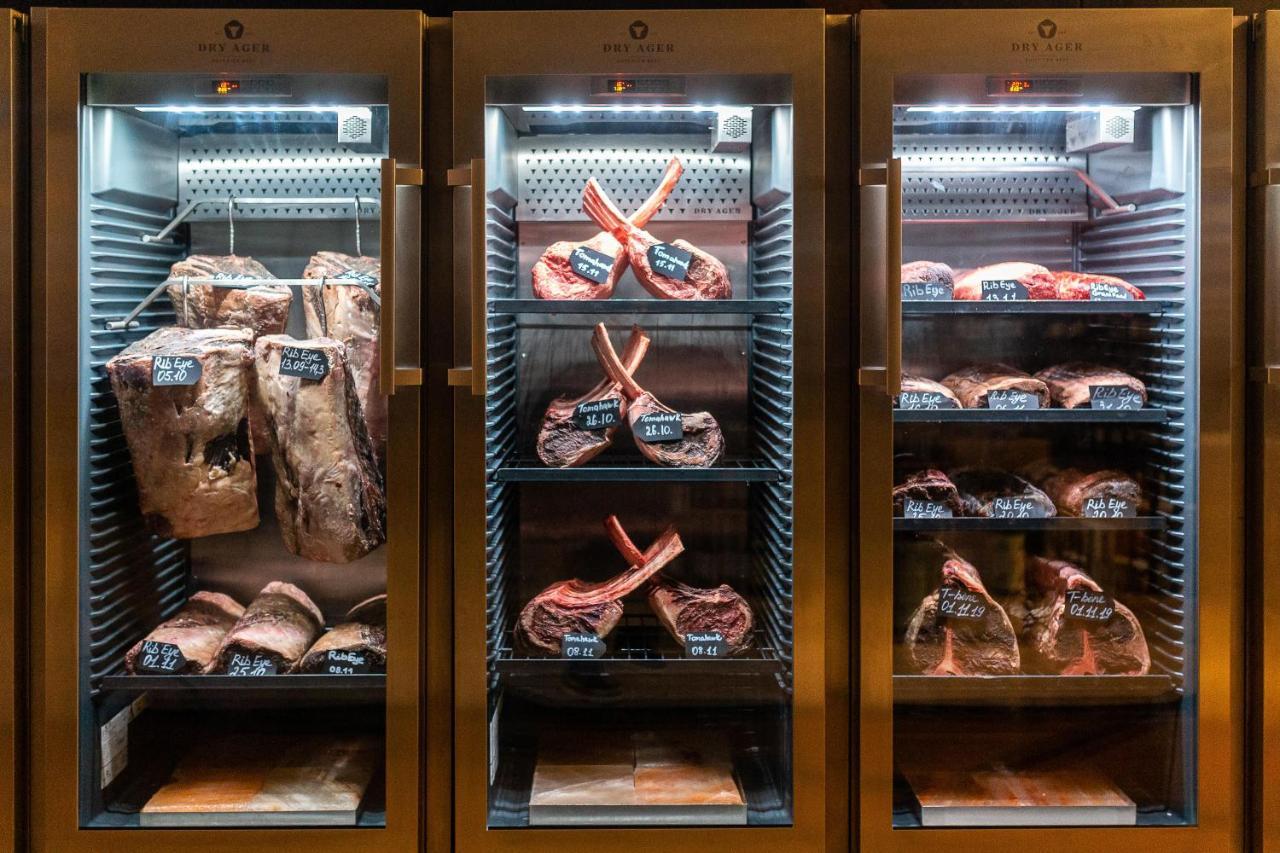 Doubletree By Hilton Minsk Hotel Bagian luar foto Dry-aged beef